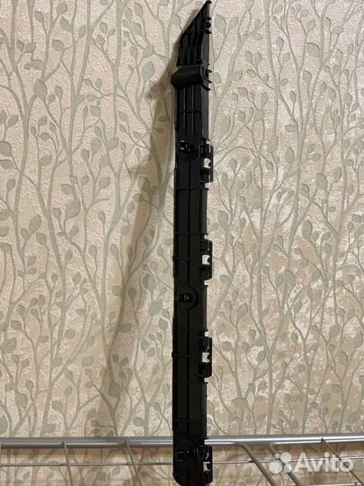 Левая клипса заднего бампера