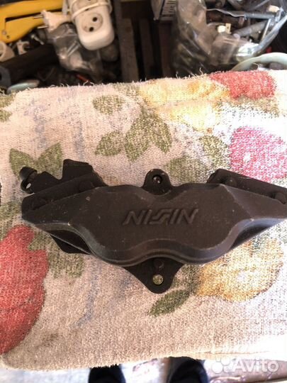 Тормозной супорт передний