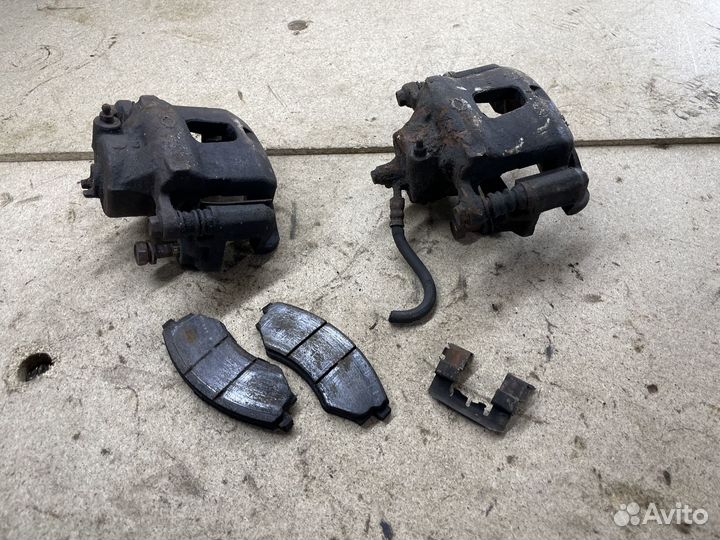 Суппорта передние Nissan Primera P11