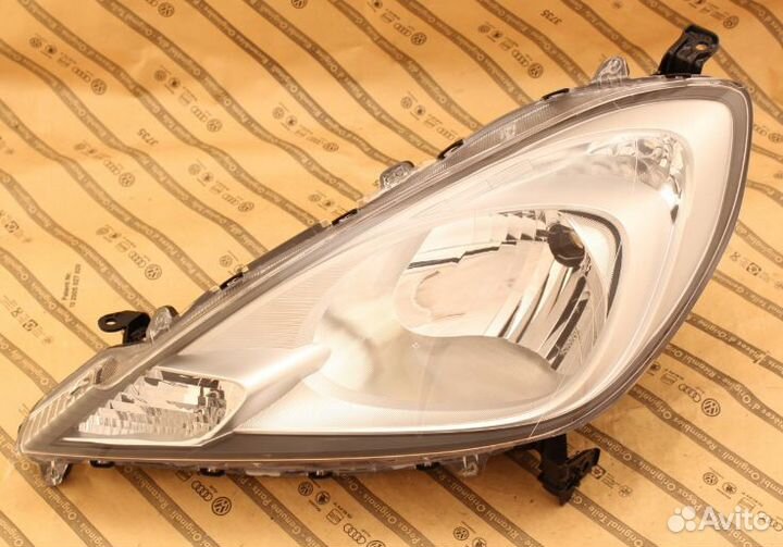 Фара левая honda jazz рест 11-15