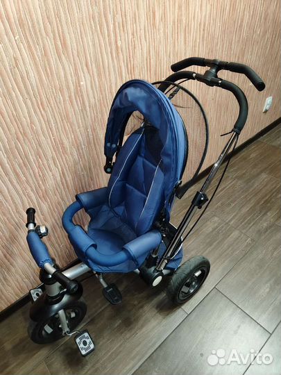 Трехколесный велосипед-коляска с ручкой