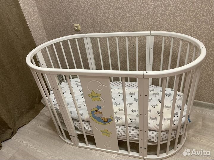 Детская кроватка с маятником овальная