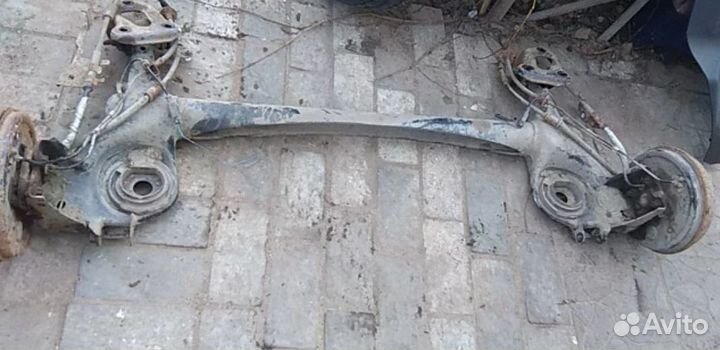 Опель корса D балка задняя