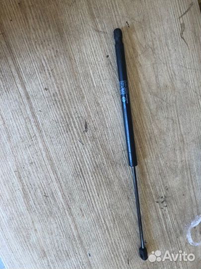 Амортизатор крышки багажника задний Ssangyong