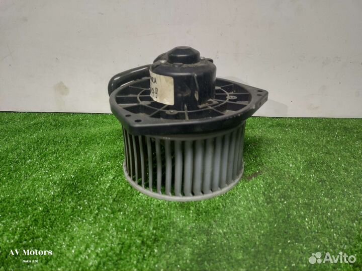 Моторчик отопителя Mitsubishi lancer 9