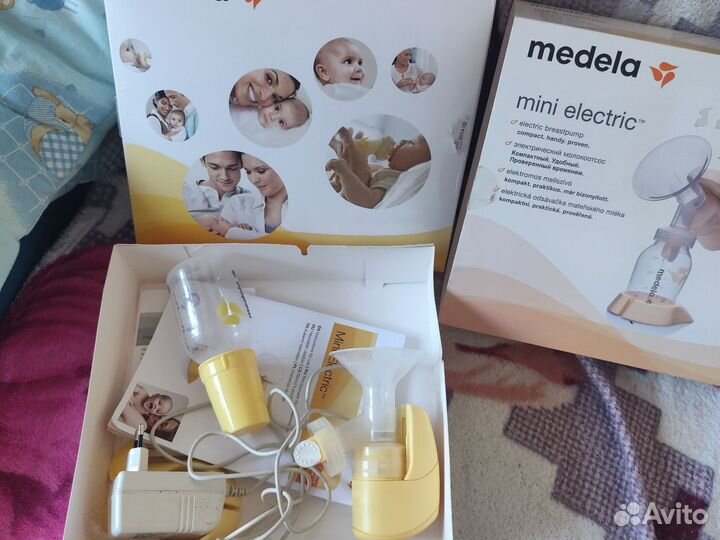 Молокоотсос medela электрический