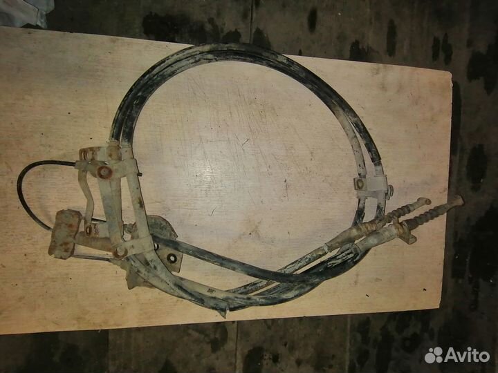 Трос стояночного тормоза киа Кларус