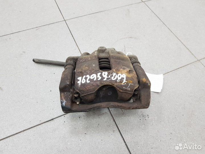 Суппорт тормозной передний правый Nissan Note