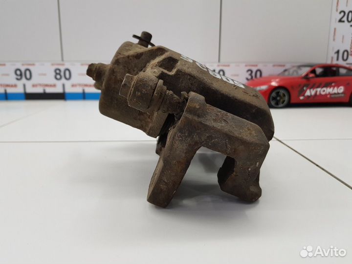 Суппорт передний левый (Daewoo Leganza)