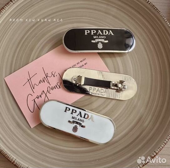 Заколки Prada