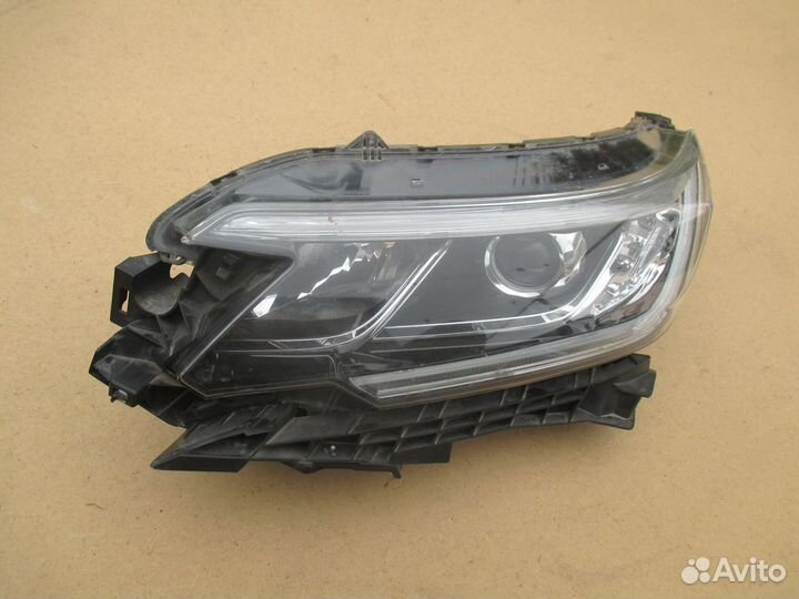 Фара левая Honda CR-V 4 рестайлинг