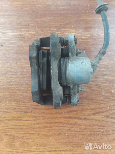 Суппорт передний левый ваз 2110