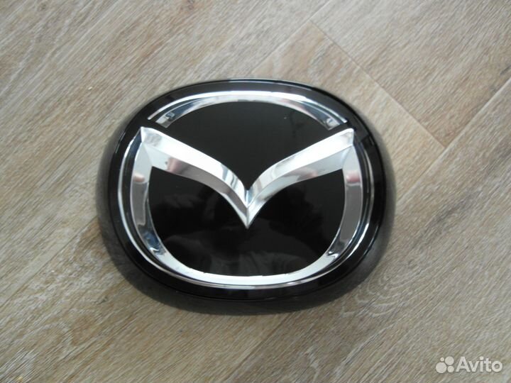 Эмблема решётки радиатора Стекло Mazda 3 BP 19-23