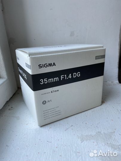 Объектив Sigma 35 mm 1.4 canon