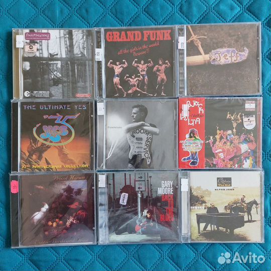 CD диски в основном Фирменные rock, jazz, pop