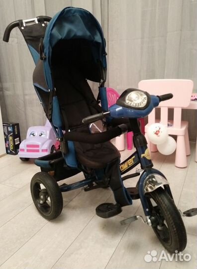 Трехколесный велосипед с ручкой
