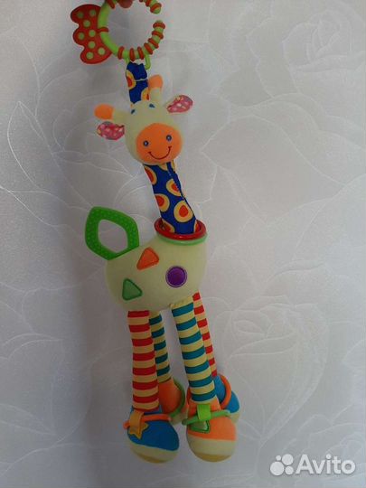Игрушка на коляску