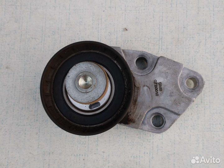 Натяжной ролик ремня грм