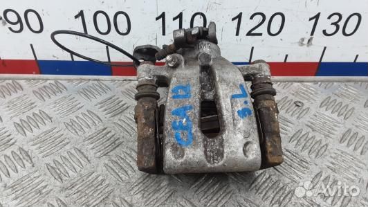 Суппорт тормозной задний левый KIA venga 1 (CEA12L