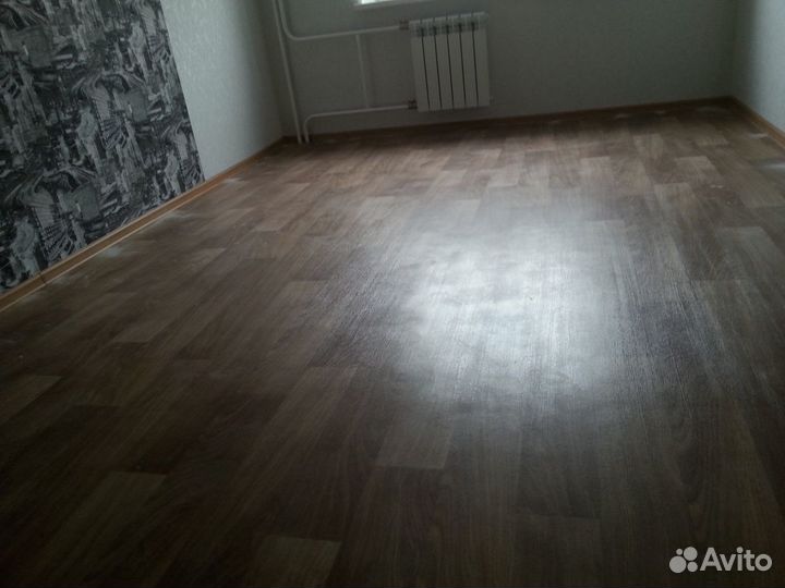 Укладка линолеума,ламината,плинтуса,склейка,фанер