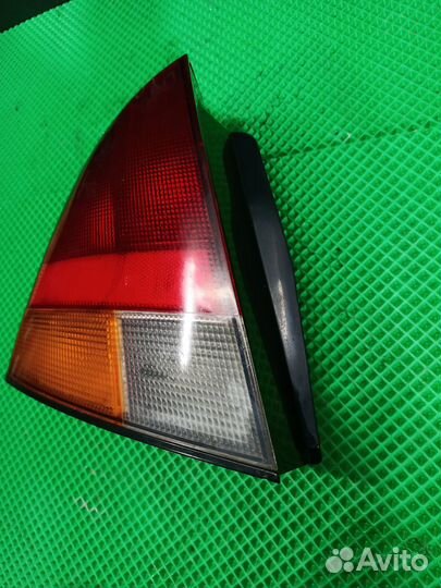 Фонарь задний в крыло левый mitsubishi carisma 199