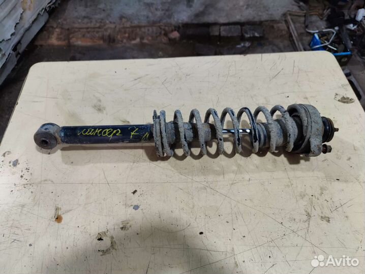 Стойка задняя Mitsubishi Lancer 7