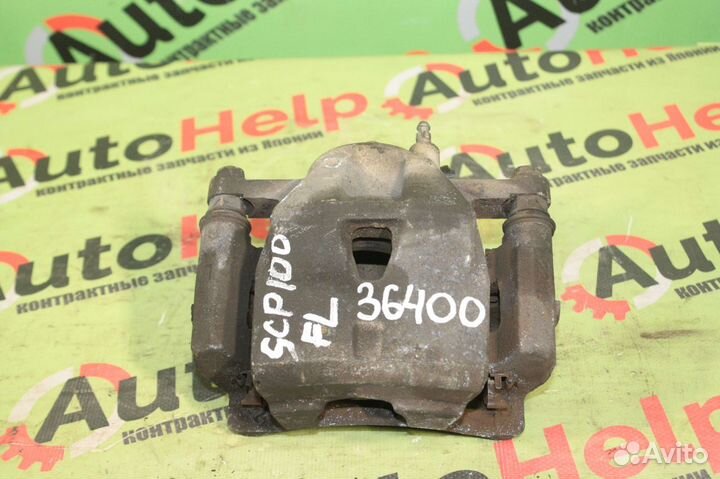 Суппорт toyota ractis SCP100 2SZ-FE 22VL перед лев