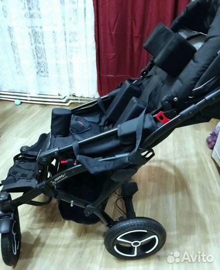 Детская инвалидная коляска