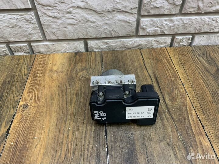 VW Polo Блок ABS (насос)