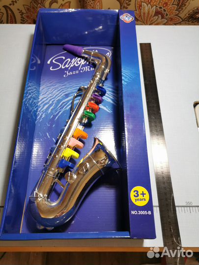 Детская игрушка Музыкальный инструмент Саксофон