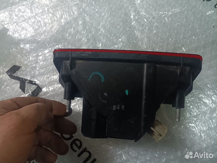 Фонарь противотуманный задний Nissan Tiida C11