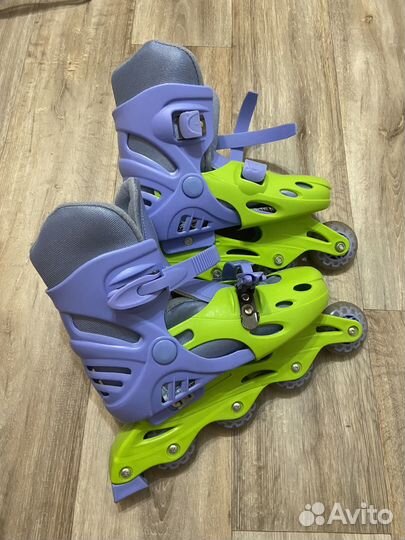 Роликовые коньки