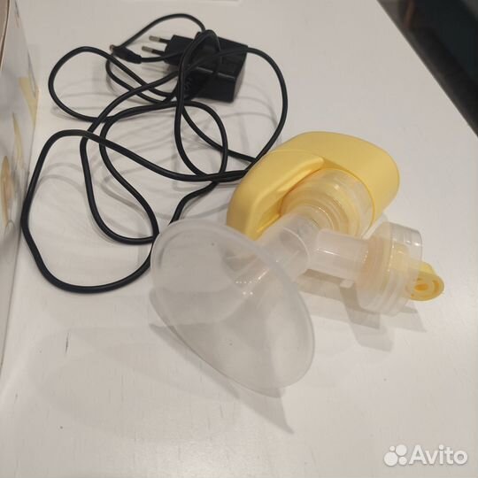 Молокоотсос medela mini electric электрический
