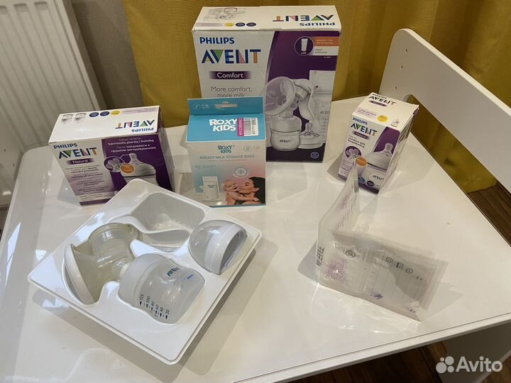 Молокоотсос и 3 бутылочки philips avent