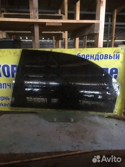 Стекло двери заднее левое Kia Shuma