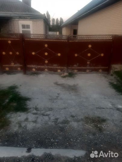 Секционные ворота с калиткой бу