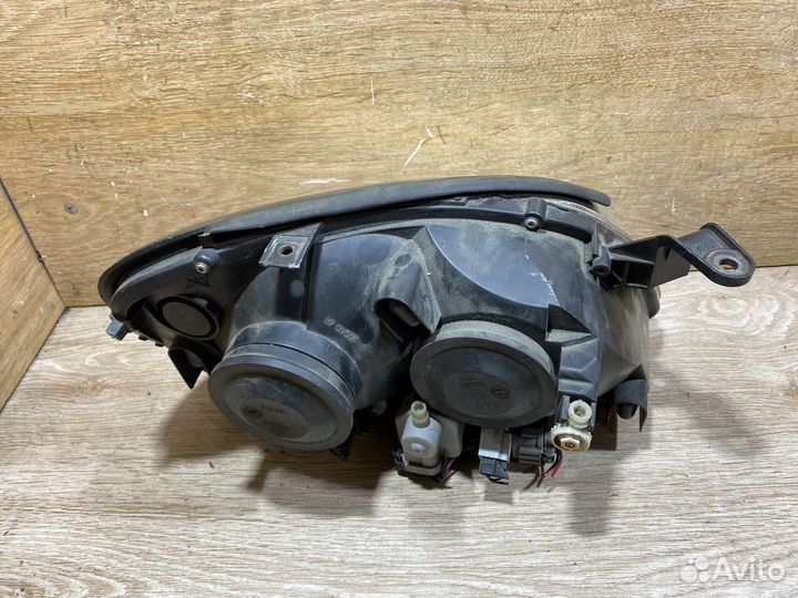 Фара передняя левая Nissan Almera Tino 142343