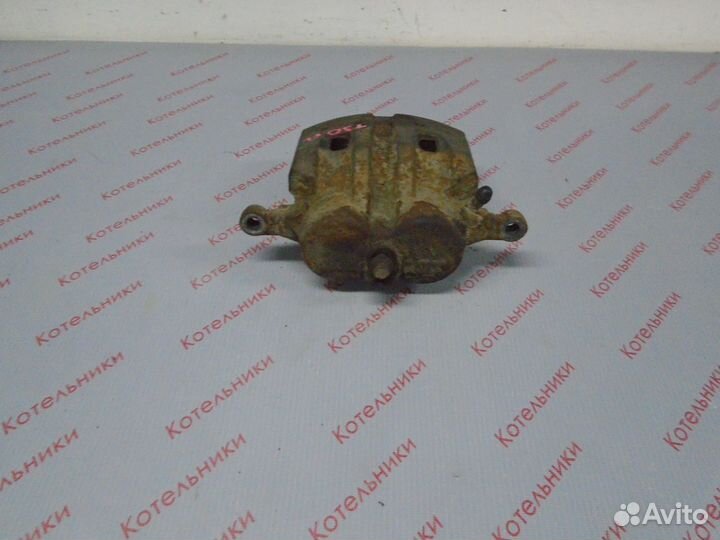 Nissan 41011-8H300 Суппорт тормозной левый