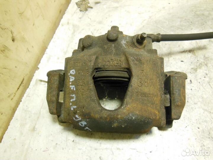 Суппорт передний левый Opel Astra F