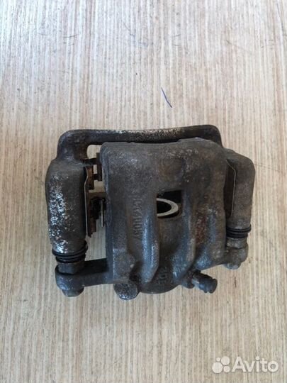 Суппорт тормозной задний левый Ssangyong Actyon