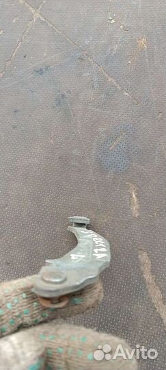 Тяга ручника левая Киа Спектра