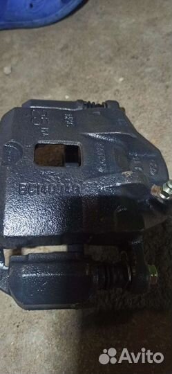 Суппорт передний левый hyundai kia