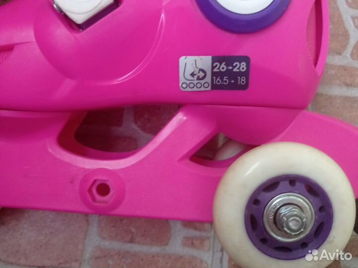 Роликовые коньки