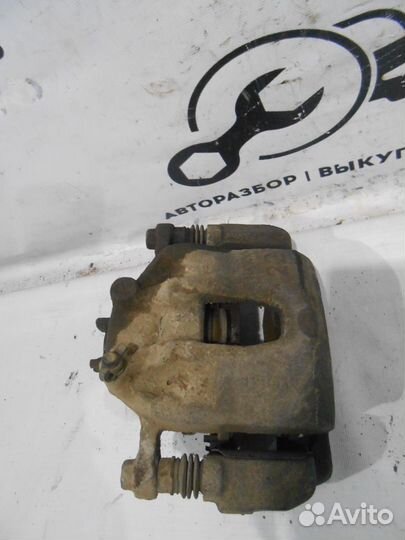 Передний правый суппорт Kia Rio 3 Hyundai Solaris