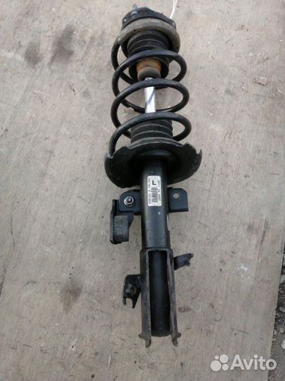 Стойка передняя левая Mazda Demio DE ZJ