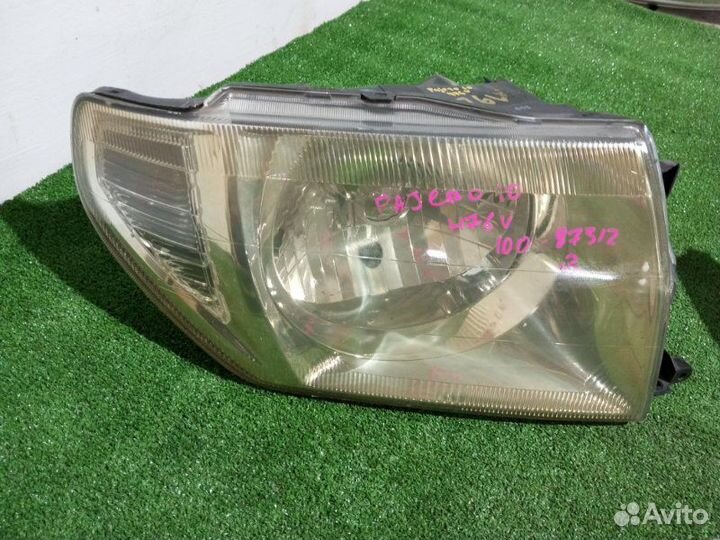 Фара галогеновая правая Mitsubishi Pajero Io H76W