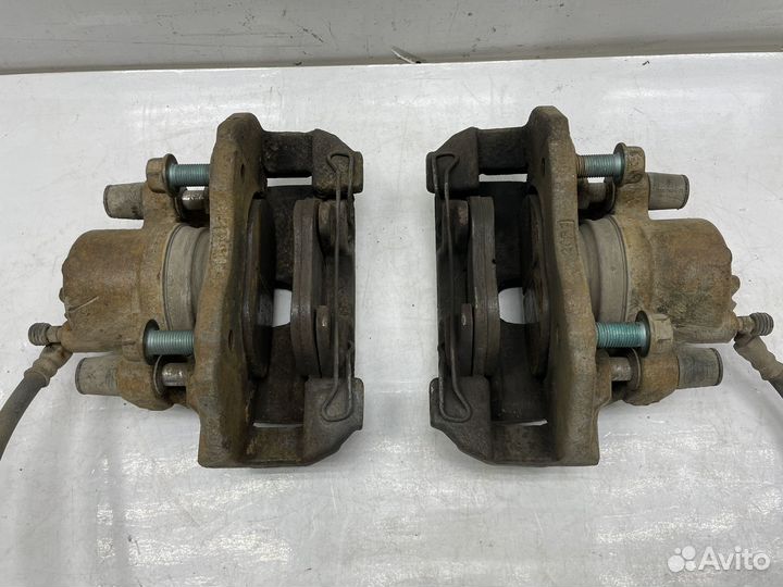 Суппорт передний левый / правый Mazda 3 BL 1.6