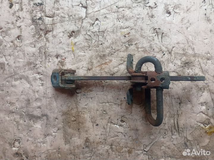 Ограничитель двери передний левый Opel Zafira A