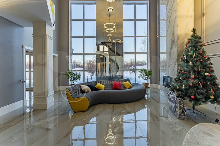 Коттедж 497 м² на участке 12 сот.