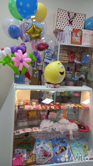 Островок упаковки подарков.Торг